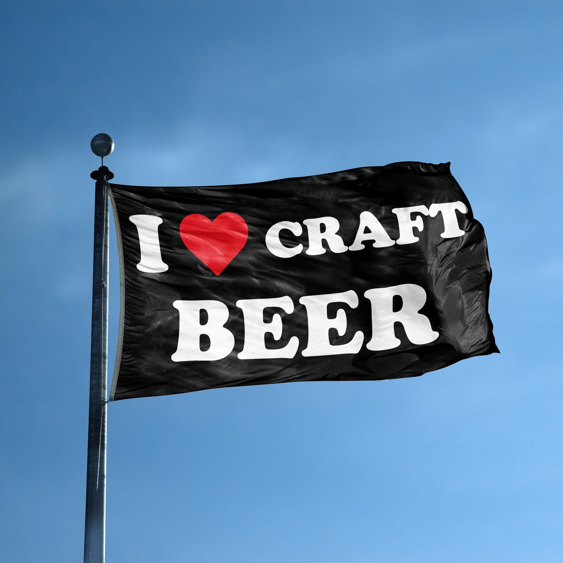 A flag with the saying "I Love Craft Beer" displayed on a high pole, with a black, white and red color scheme.