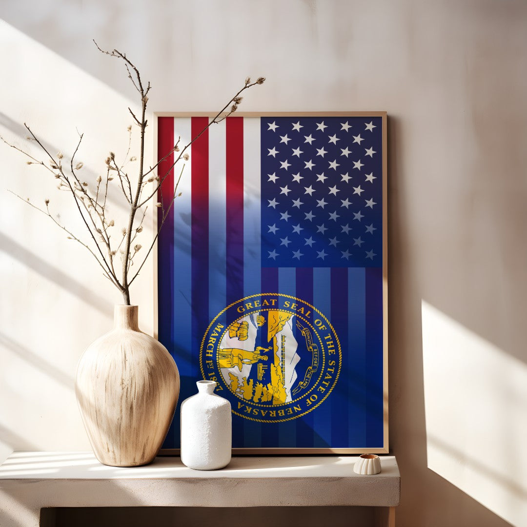 Blended US and Nebraska flag print in a wooden frame, showcasing American stars & stripes merged with Nebraska’s emblem, displayed on a tabletop.