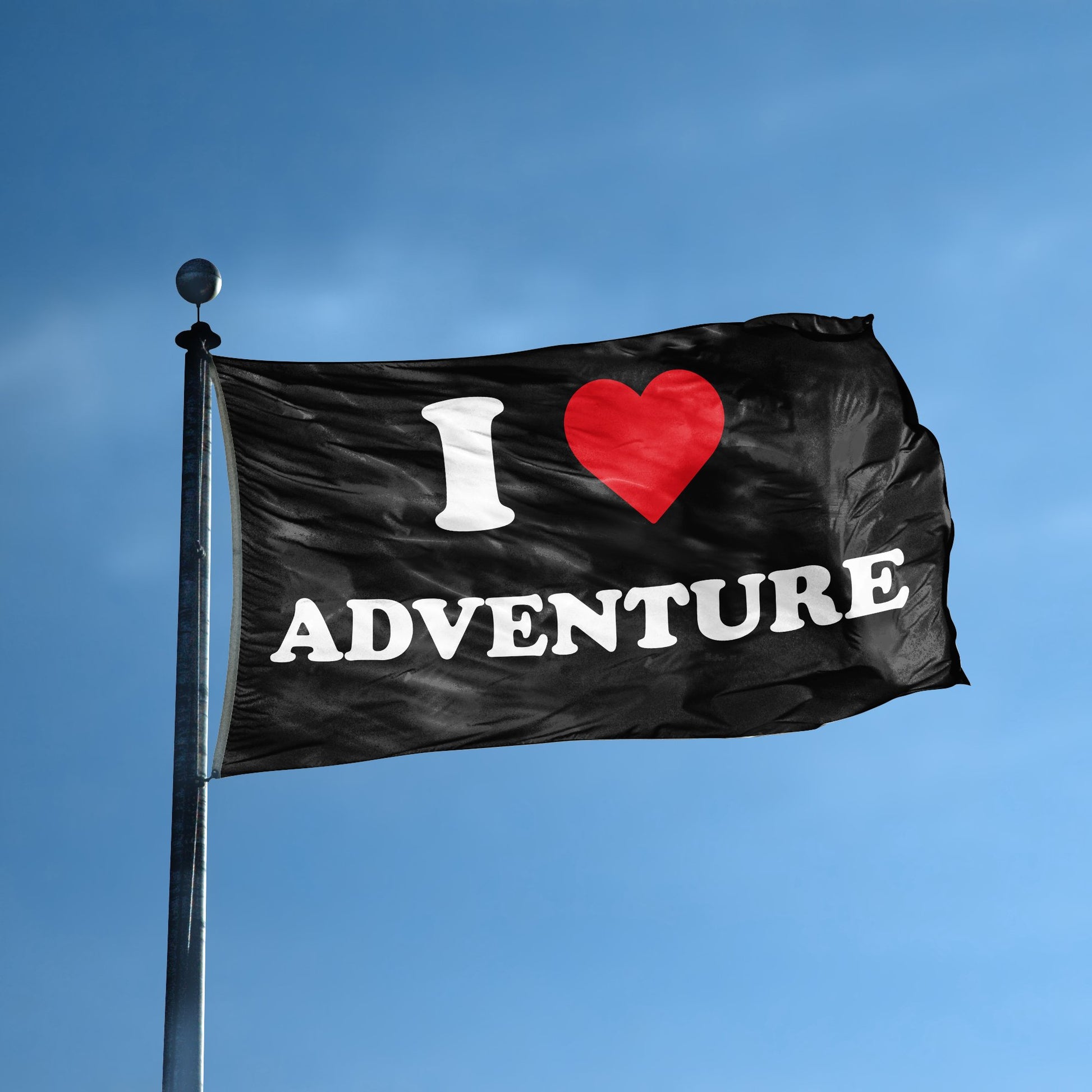 A flag with the saying "I Love Adventure" displayed on a high pole, with a black, white and red color scheme.