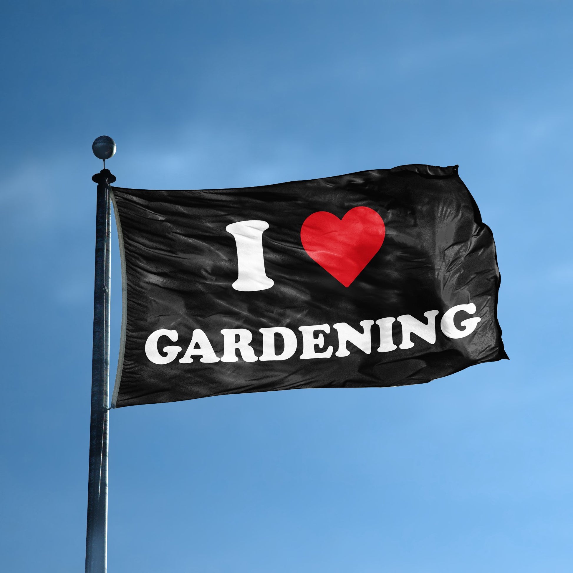 A flag with the saying "I Love Gardening" displayed on a high pole, with a black, white and red color scheme.