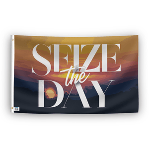A flag with a gradient of colors transitioning from dark blue to orange, with the phrase 'SEIZE the DAY' in white letters.