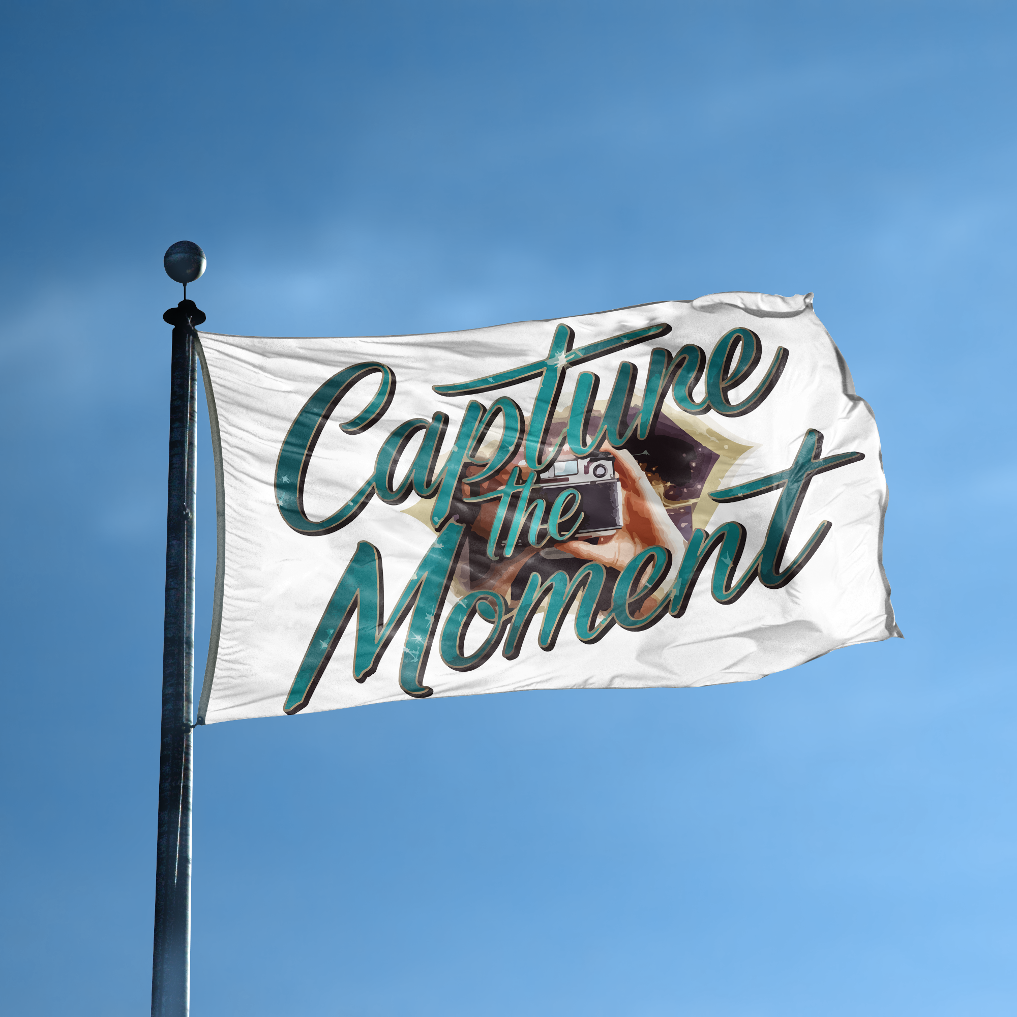 A flag with the saying "Capture The Moment Now" displayed on a high pole, with a special occasion color scheme.