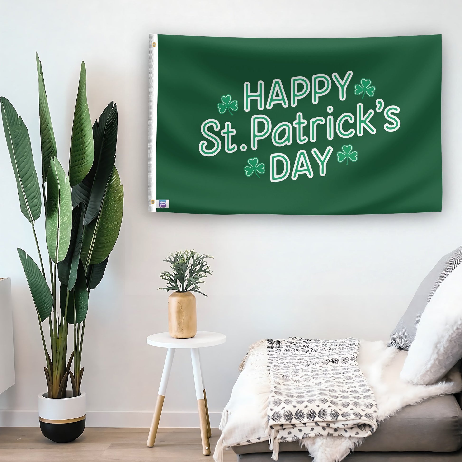 In a home setting, a flag with the saying "Happy St. Patrick's Day" is mounted on a white wall by a side table.