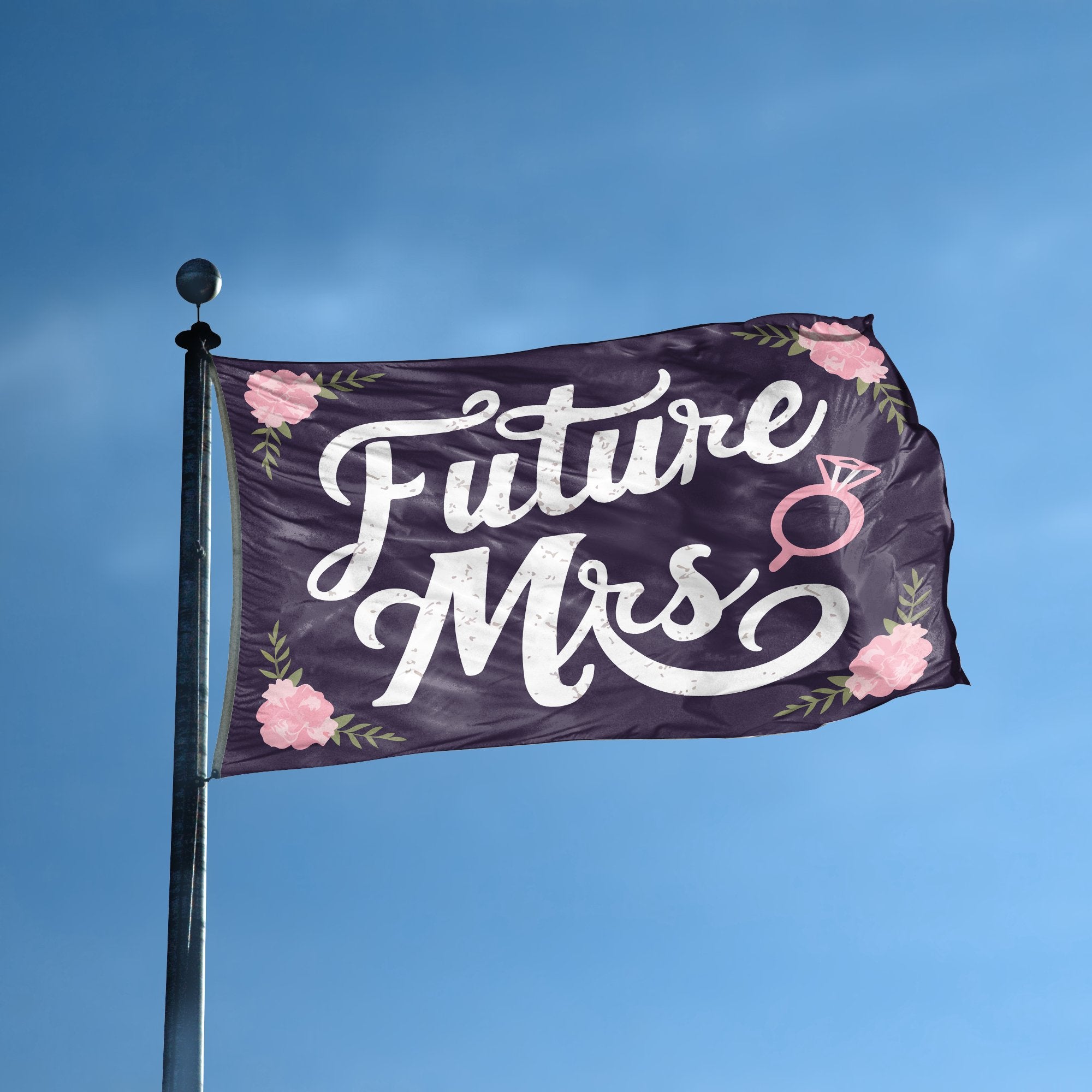 A flag with the saying "Future Mrs Engagement" displayed on a high pole, with a special occasion color scheme.