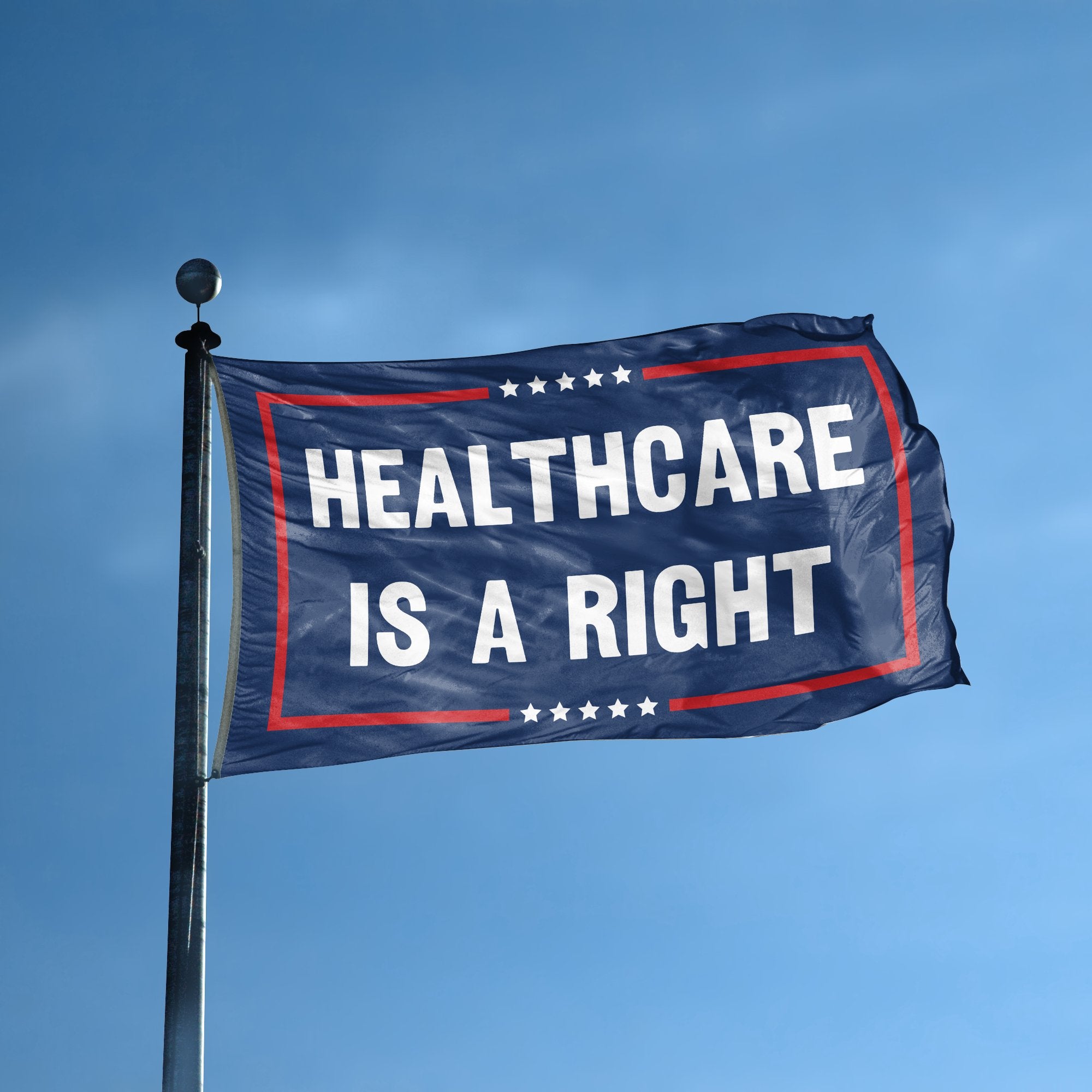 A flag with the saying "Healthcare Is A Right Political" displayed on a high pole, with a red, white, and blue color scheme.