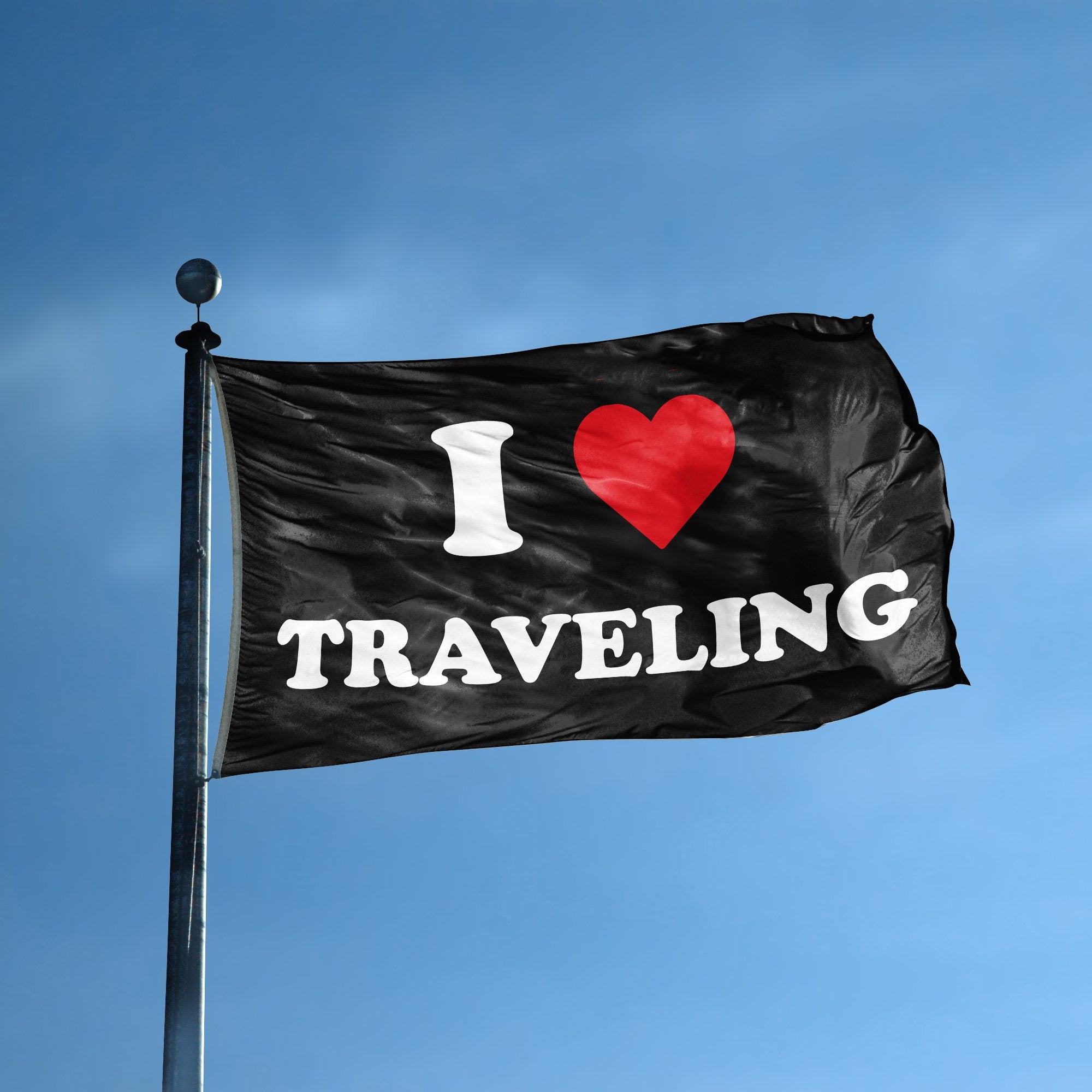 A flag with the saying "I Love Traveling" displayed on a high pole, with a black, white and red color scheme.