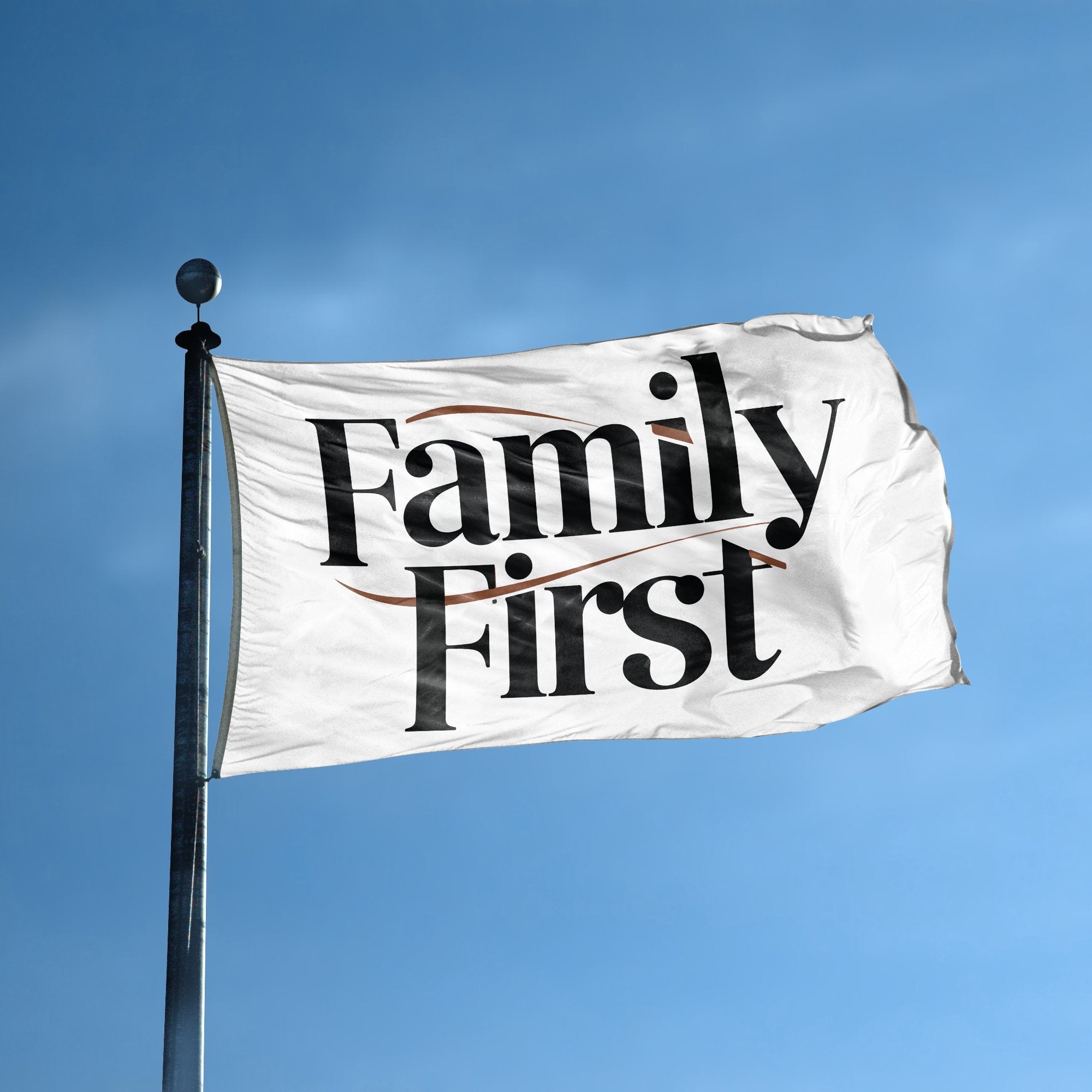 A flag with the saying "Family First" displayed on a high pole, with a special occasion color scheme.