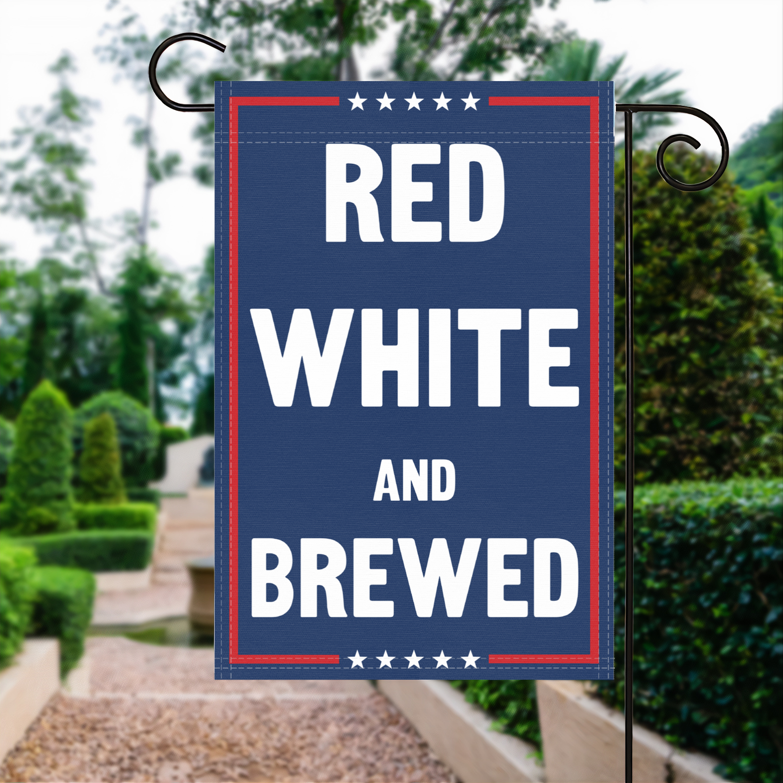 A red, white and blue political garden flag with the slogan Red White And Brewed.