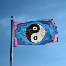 Load image into Gallery viewer, A flag with the saying &quot;Yin and Yang Symbol&quot; displayed on a high pole, with a tie dye style color scheme.
