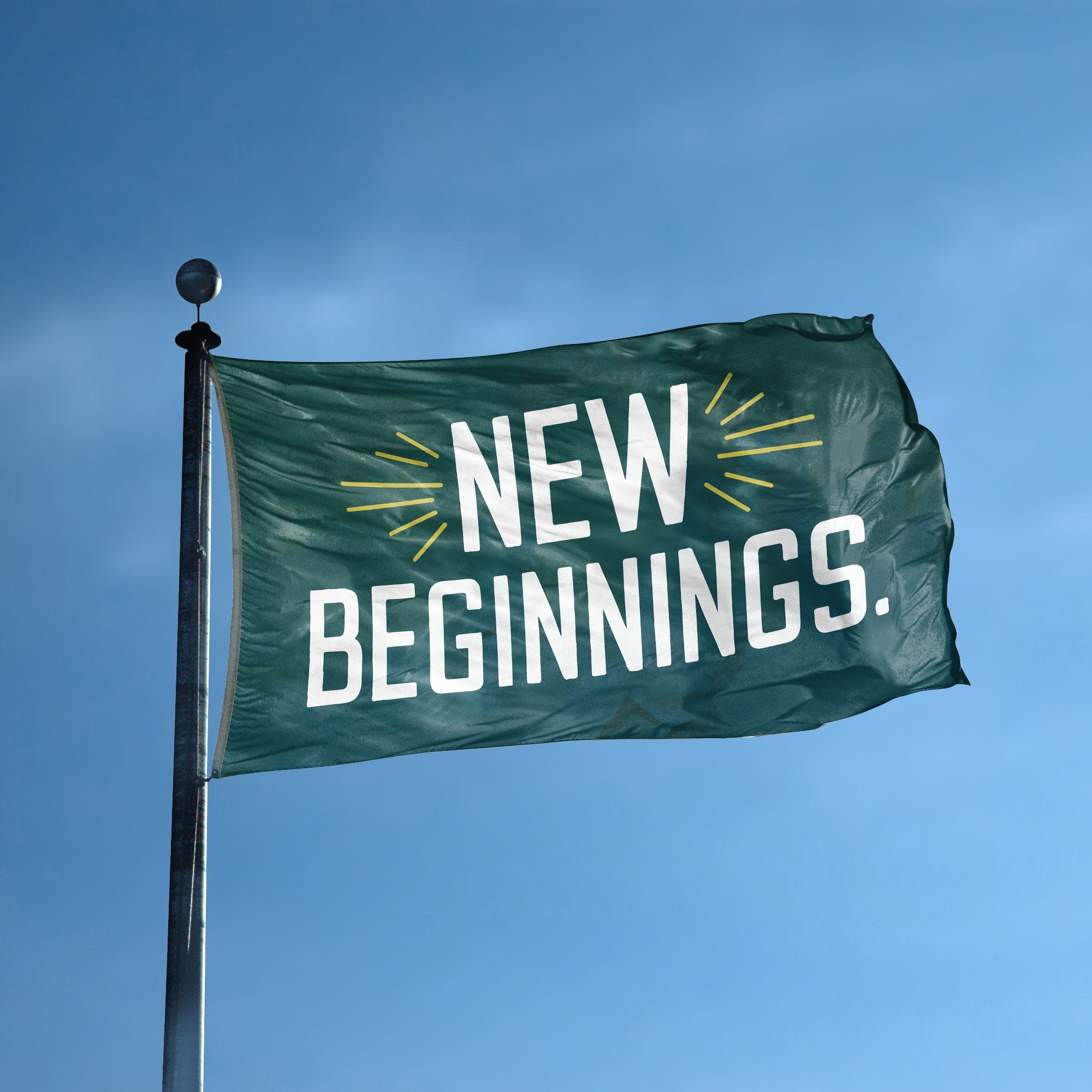 A flag with the saying "New Beginnings" displayed on a high pole, with a special occasion color scheme.