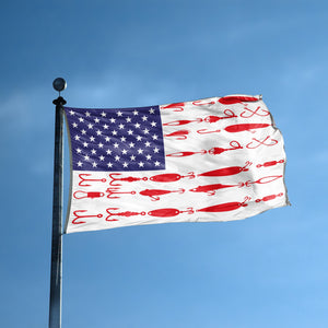 An american flag with the red stripes changed to match the theme "Fishing Tackle Stripes American" displayed on a high pole.