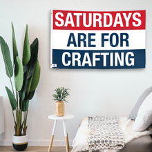 Load image into Gallery viewer, In a home setting, a flag with the saying &quot;https://www.dropbox.com/scl/fi/h1drkdbh86cuqoxdn7fni/saturdays-are-for-crafting_room.png?rlkey=zhp3h0wxvkzklmvodvpepqz0p&amp;raw=1&quot; is mounted on a white wall by a side table.
