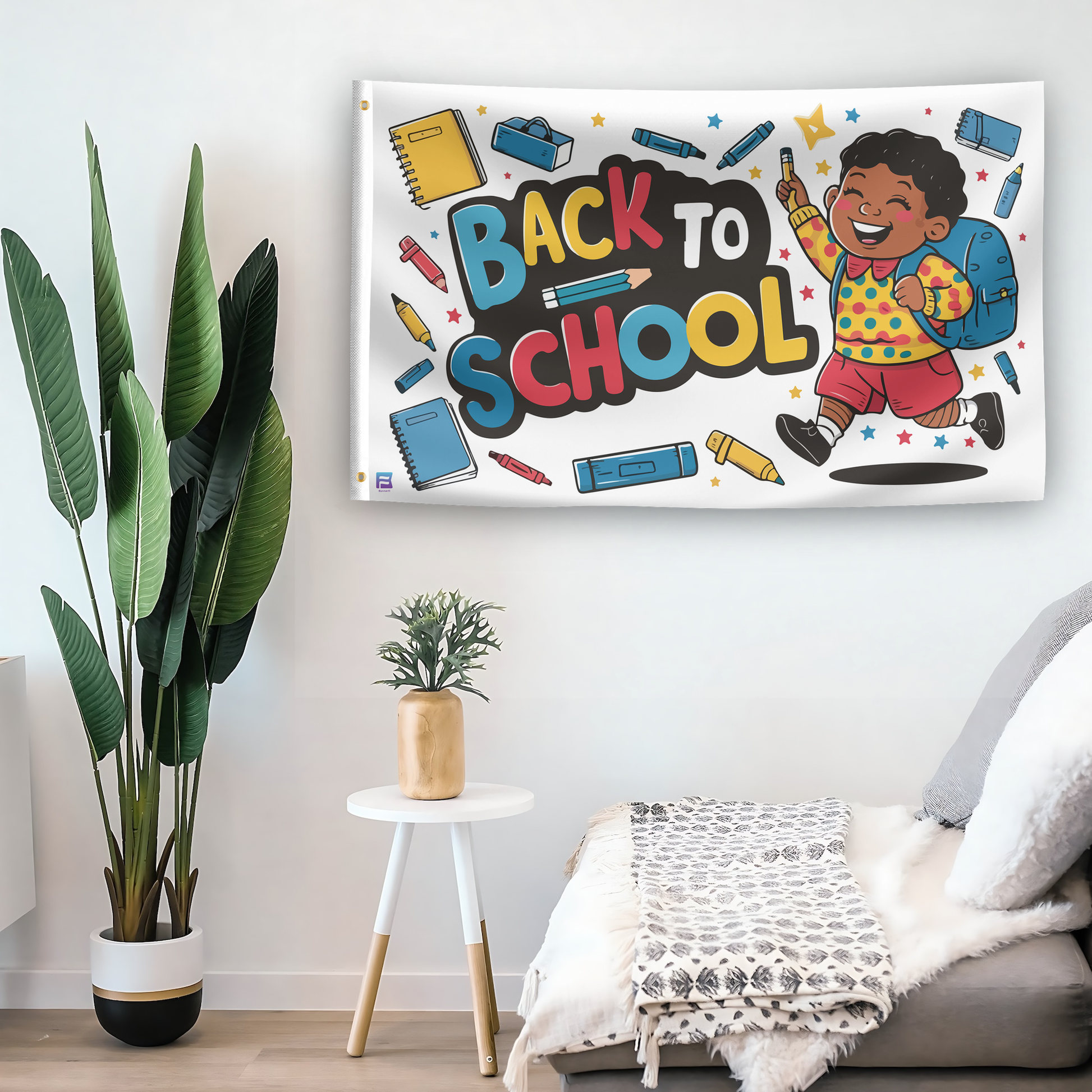 In a home setting, a flag with the saying "Back To School Classroom" is mounted on a white wall by a side table.