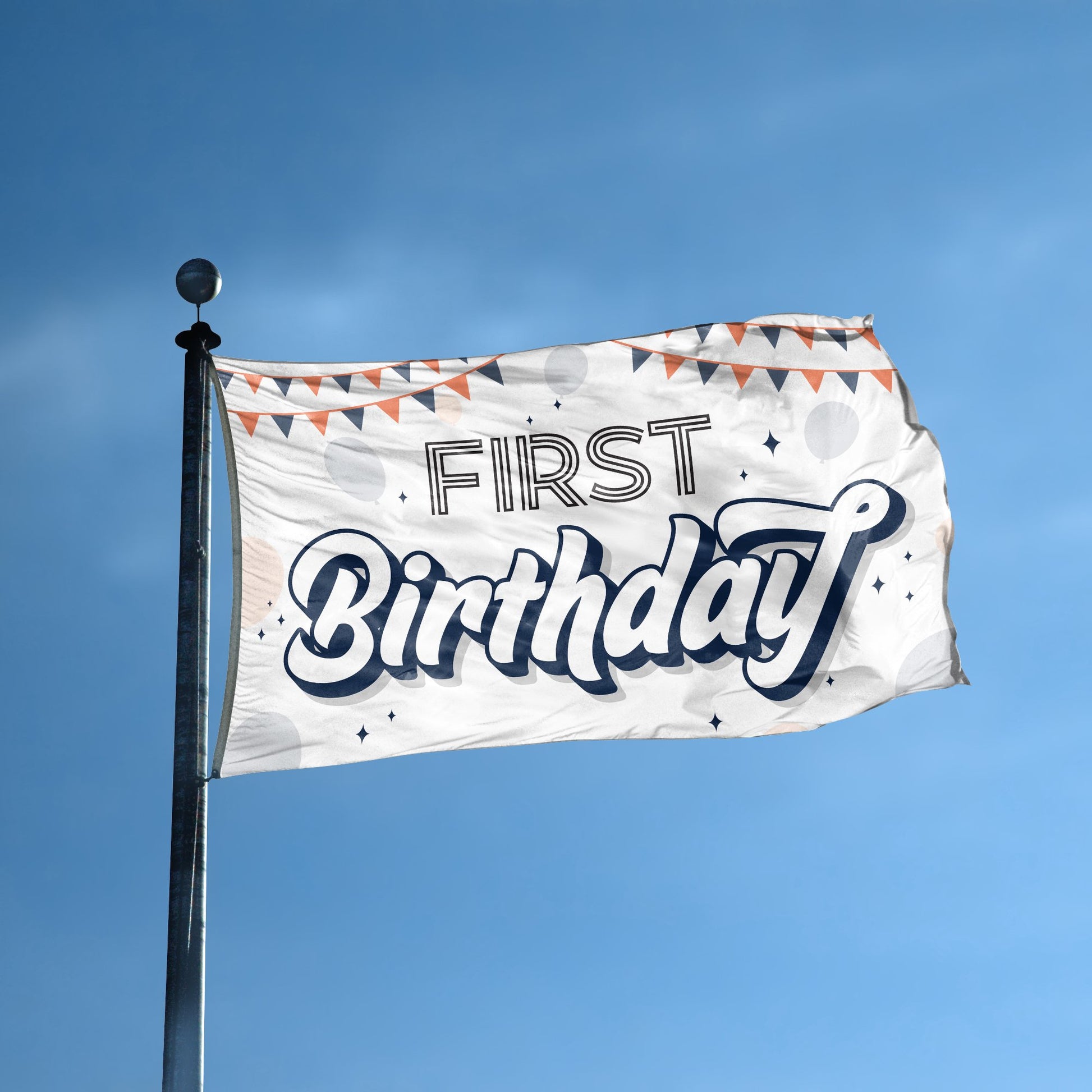 A flag with the saying "First Birthday" displayed on a high pole, with a special occasion color scheme.