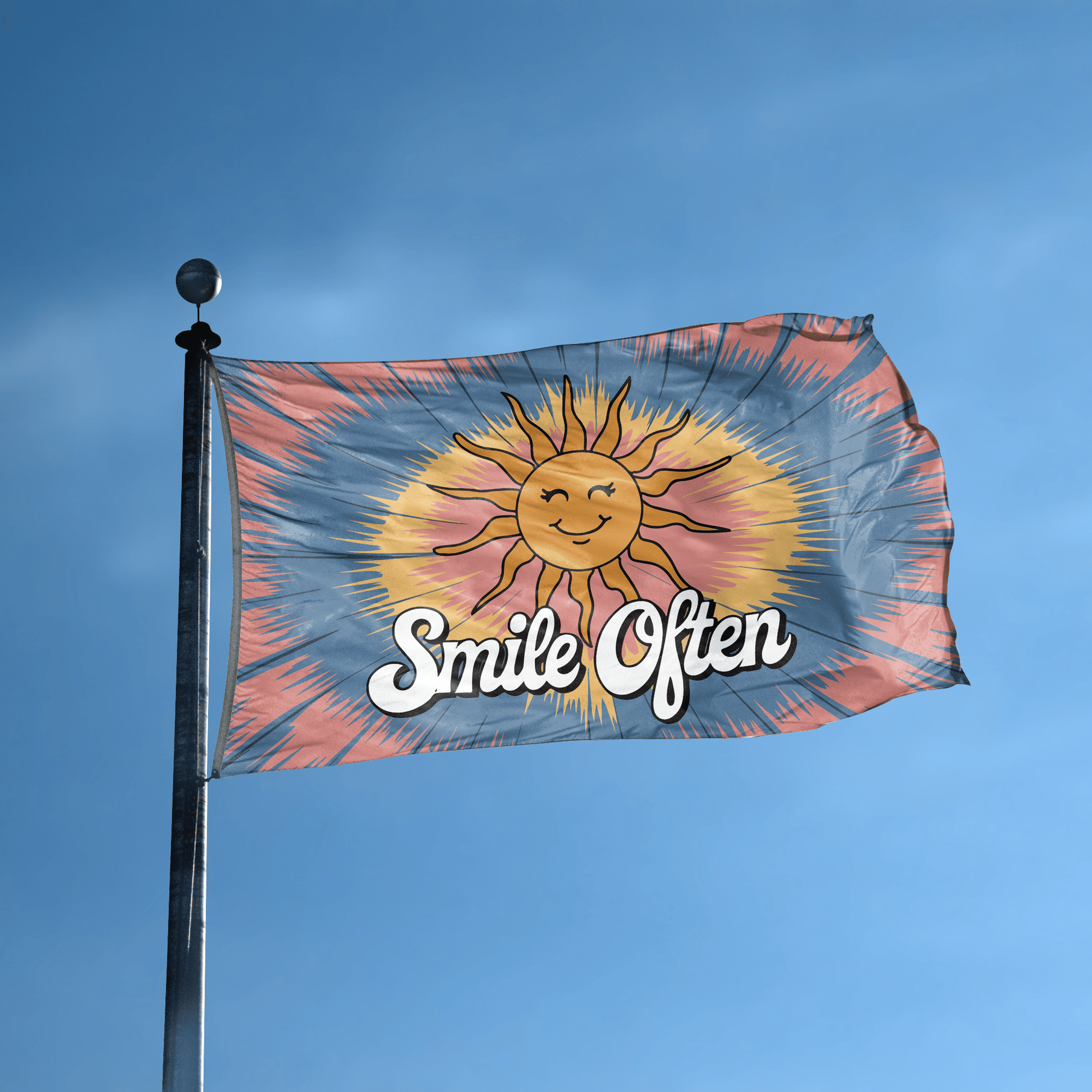 A flag with the saying "Smile Often 70s Style" displayed on a high pole, with a tie dye style color scheme.