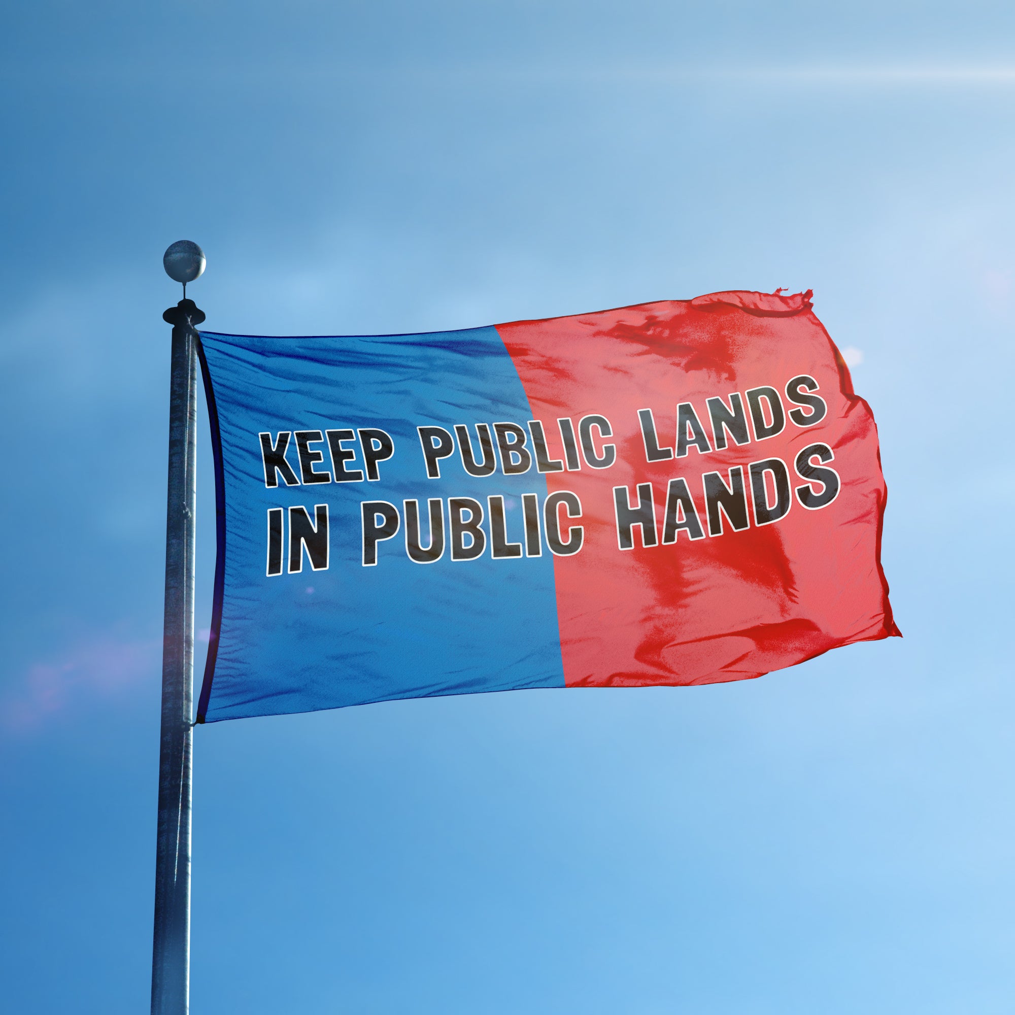 A flag containing a political slogan displayed on a high pole, featuring a patriotic red and blue background.