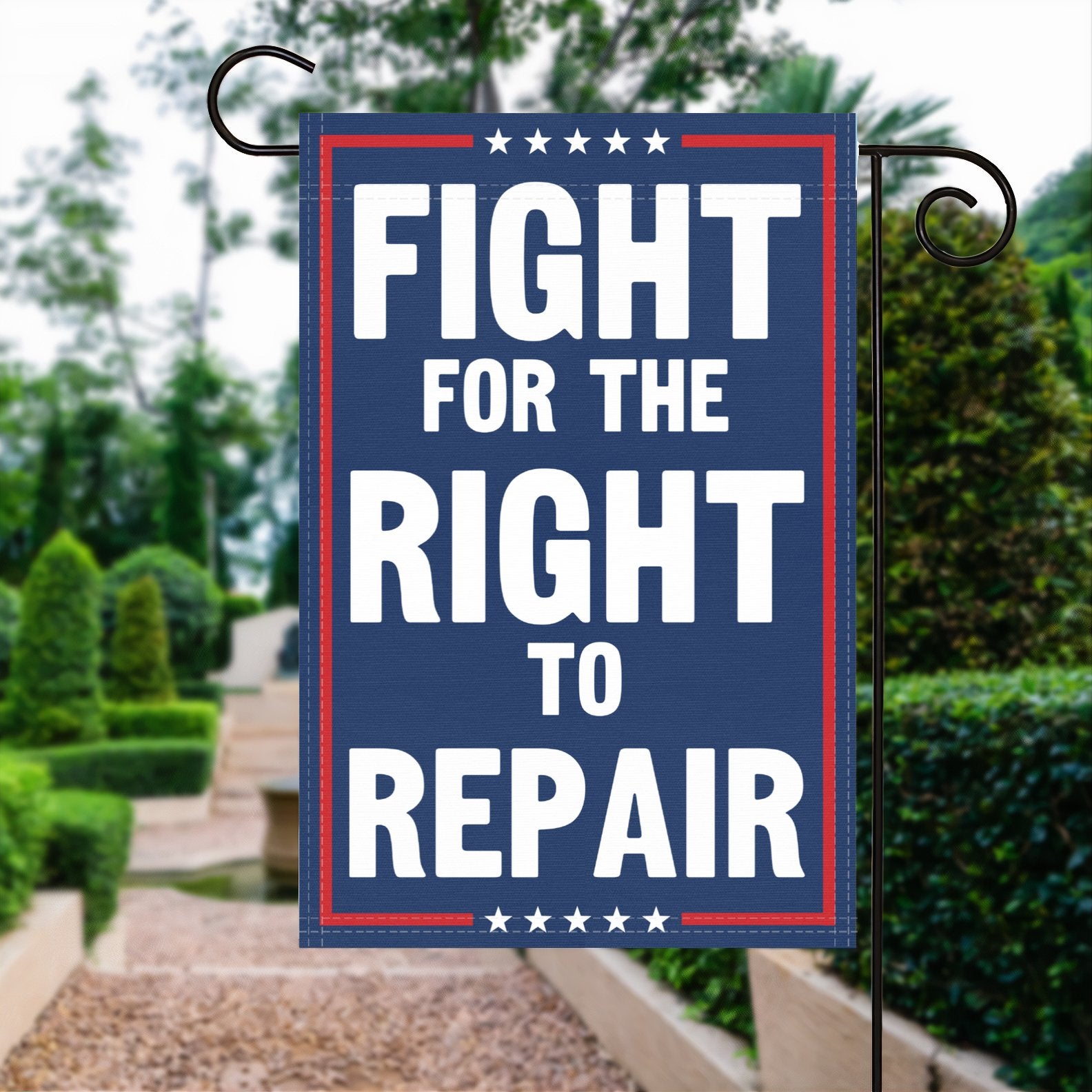 A red, white and blue political garden flag with the slogan Fight For The Right To Repair.