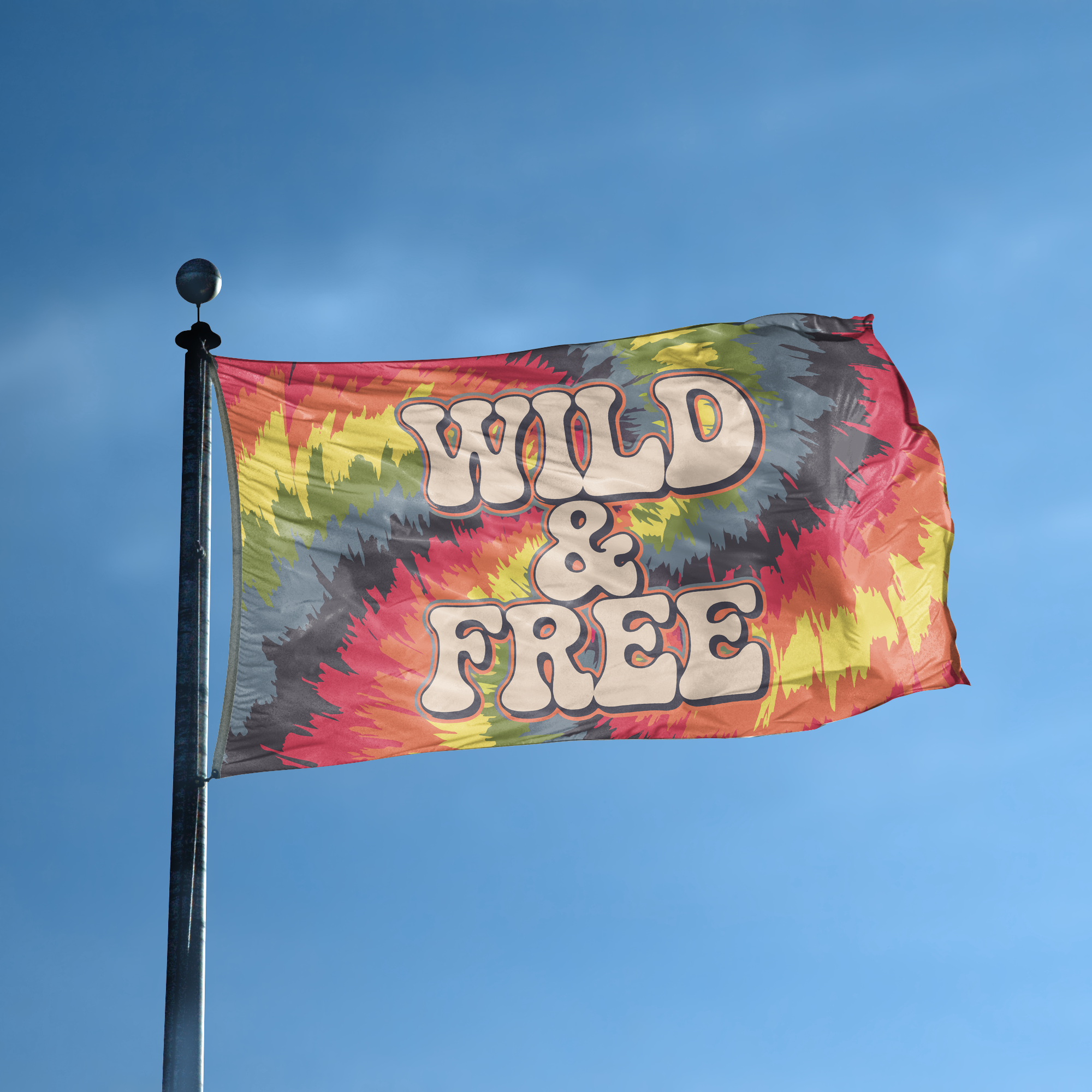 A flag with the saying "Wild and Free" displayed on a high pole, with a tie dye style color scheme.