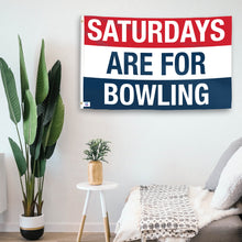 Load image into Gallery viewer, In a home setting, a flag with the saying &quot;https://www.dropbox.com/scl/fi/8wkaest3npm1p5foc8bci/saturdays-are-for-bowling_room.png?rlkey=ef72opyw6pxw8vyoeev687n87&amp;raw=1&quot; is mounted on a white wall by a side table.
