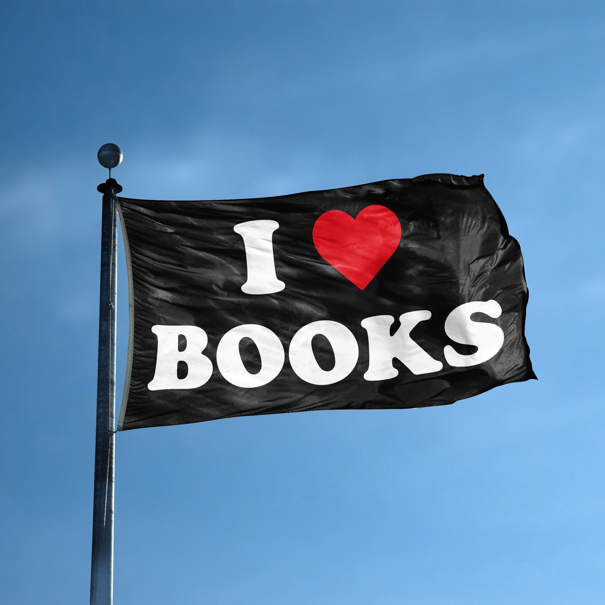 A flag with the saying "I Love Books" displayed on a high pole, with a black, white and red color scheme.