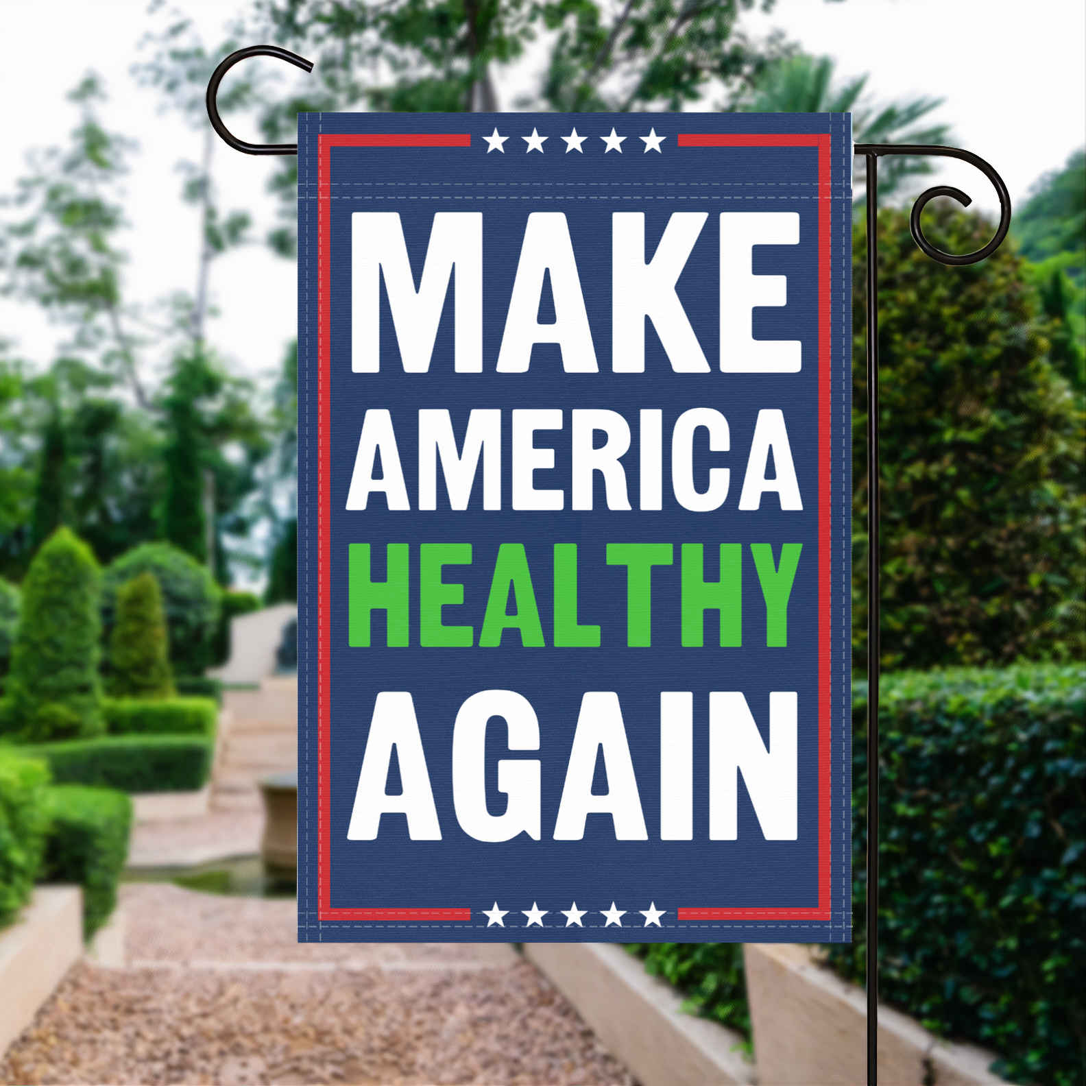 A red, white and blue political garden flag with the slogan Make America Healthy Again.