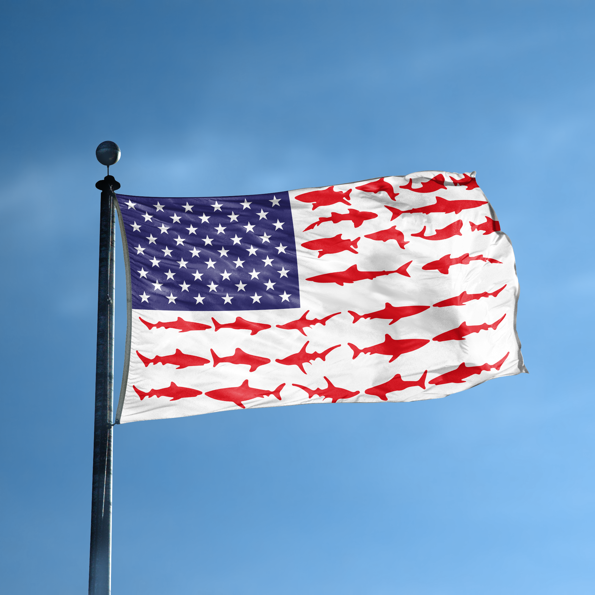 An american flag with the red stripes changed to match the theme "Shark Stripes American" displayed on a high pole.