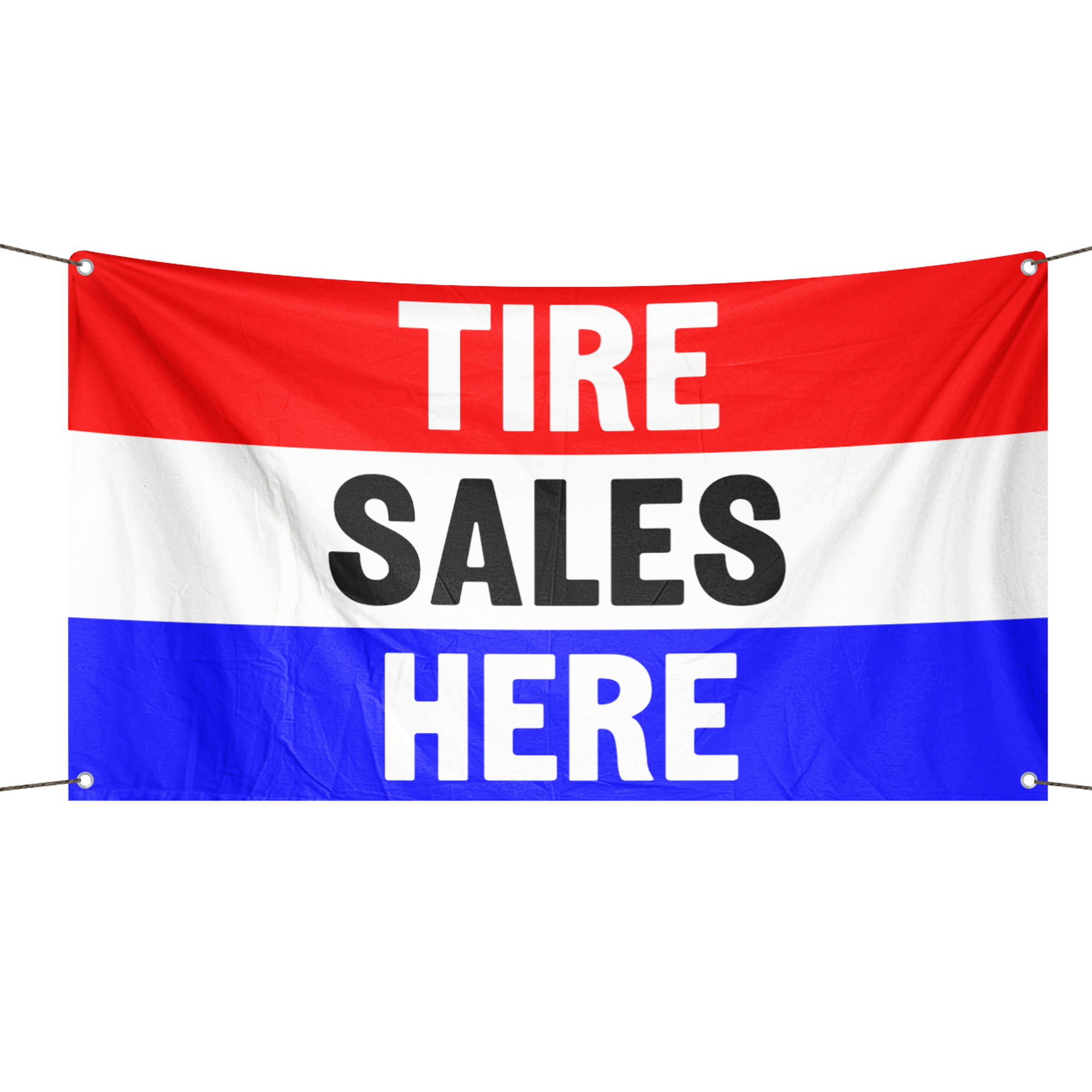 A business banner with the saying "Tire Sales Here", with a red, white, and blue color scheme.