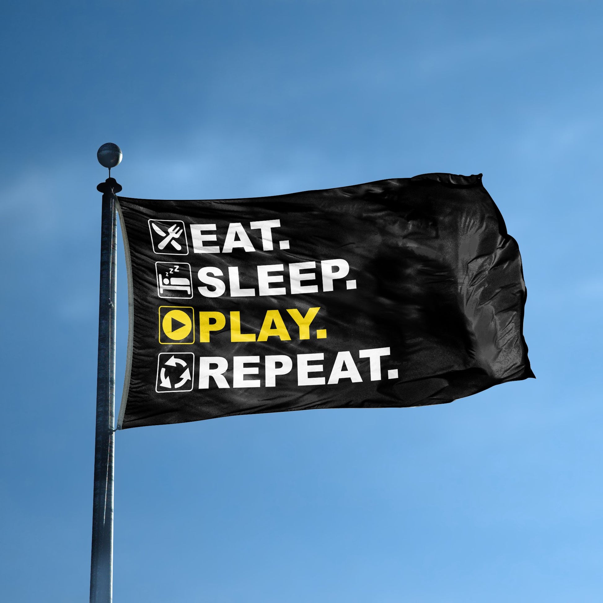 A flag with the saying "Eat Sleep Play Repeat" displayed on a high pole, with a black, white and themed color scheme.