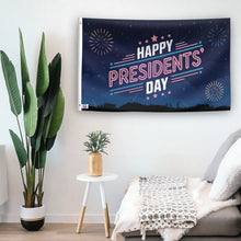 Load image into Gallery viewer, In a home setting, a flag with the saying &quot;Presidents&#39; Day&quot; is mounted on a white wall by a side table.
