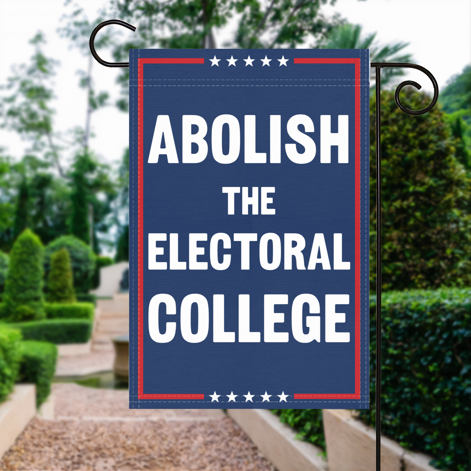 A red, white and blue political garden flag with the slogan Abolish The Electoral College.