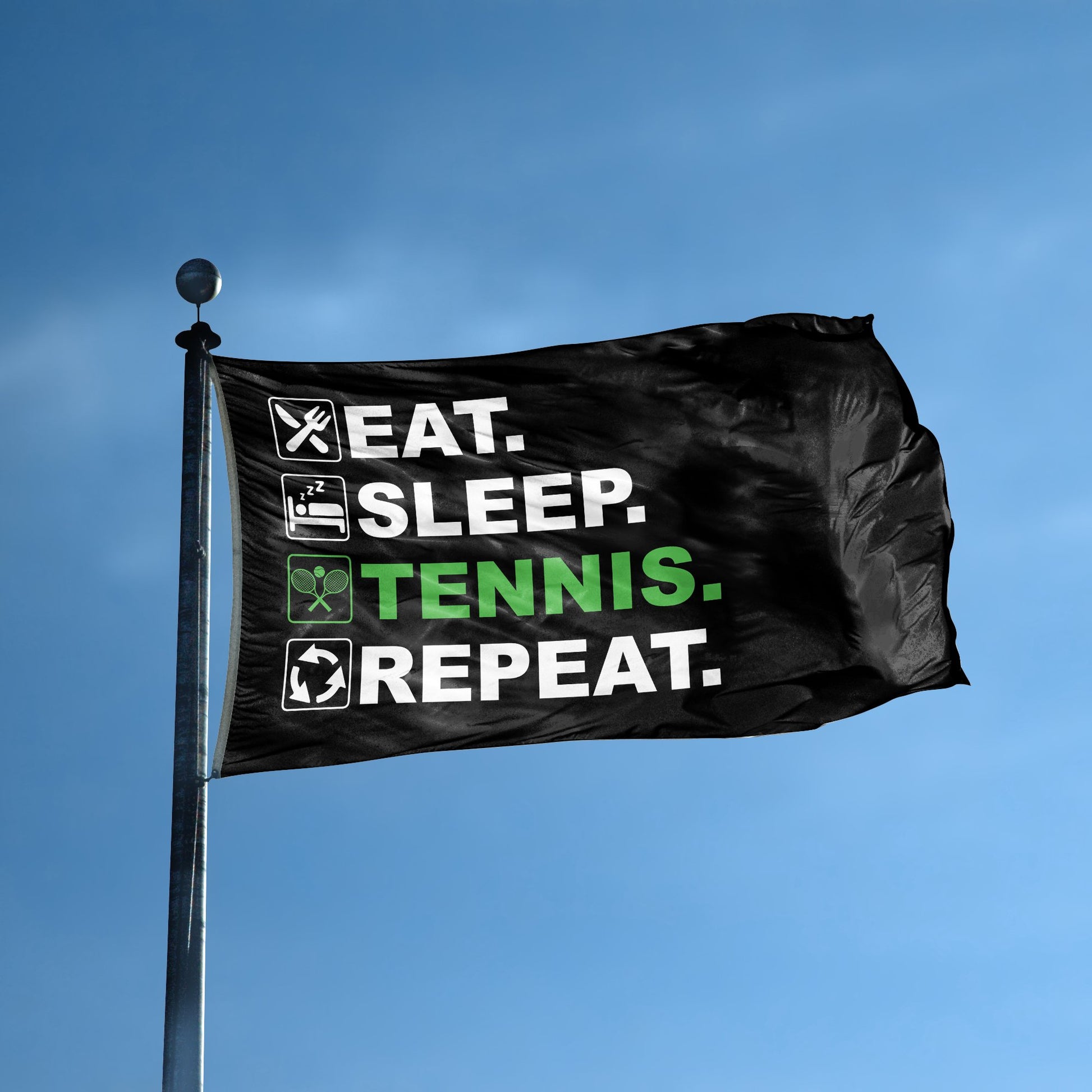 A flag with the saying "Eat Sleep Tennis Repeat" displayed on a high pole, with a black, white and themed color scheme.