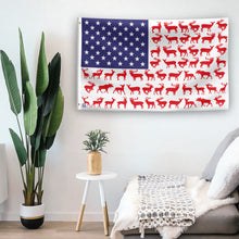 Load image into Gallery viewer, In a home setting, an american flag with the theme &quot;Deer Stripes American&quot; is mounted on a white wall by a side table.
