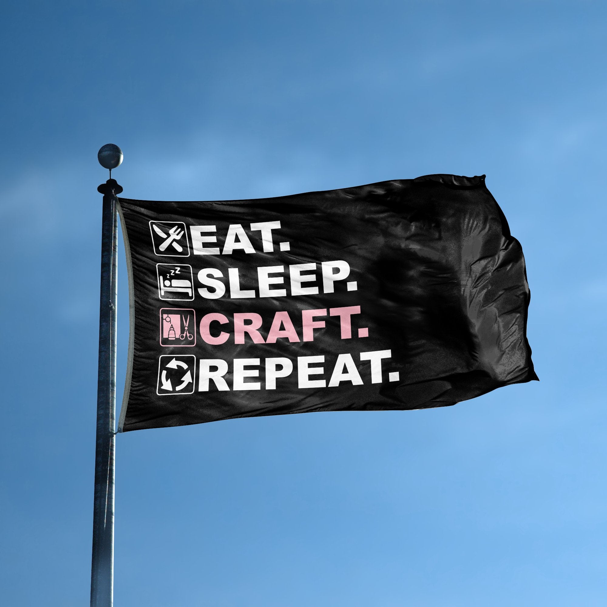 A flag with the saying "Eat Sleep Craft Repeat" displayed on a high pole, with a black, white and themed color scheme.