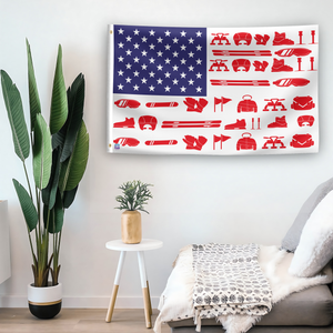 In a home setting, an american flag with the theme "Snow Sports Stripes American" is mounted on a white wall by a side table.