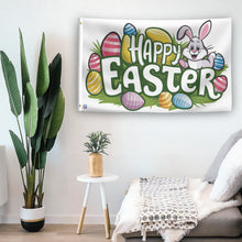 Load image into Gallery viewer, In a home setting, a flag with the saying &quot;Happy Easter&quot; is mounted on a white wall by a side table.
