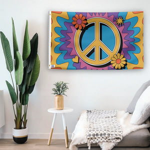 In a home setting, a flag with the saying "Peace Sign" is mounted on a white wall by a side table.