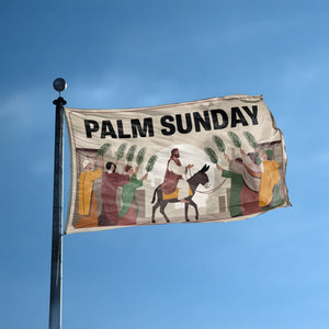 A flag with the saying "Palm Sunday" displayed on a high pole, with a holiday themed color scheme.