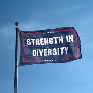 A flag with the saying "Strength In Diversity Political" displayed on a high pole, with a red, white, and blue color scheme.