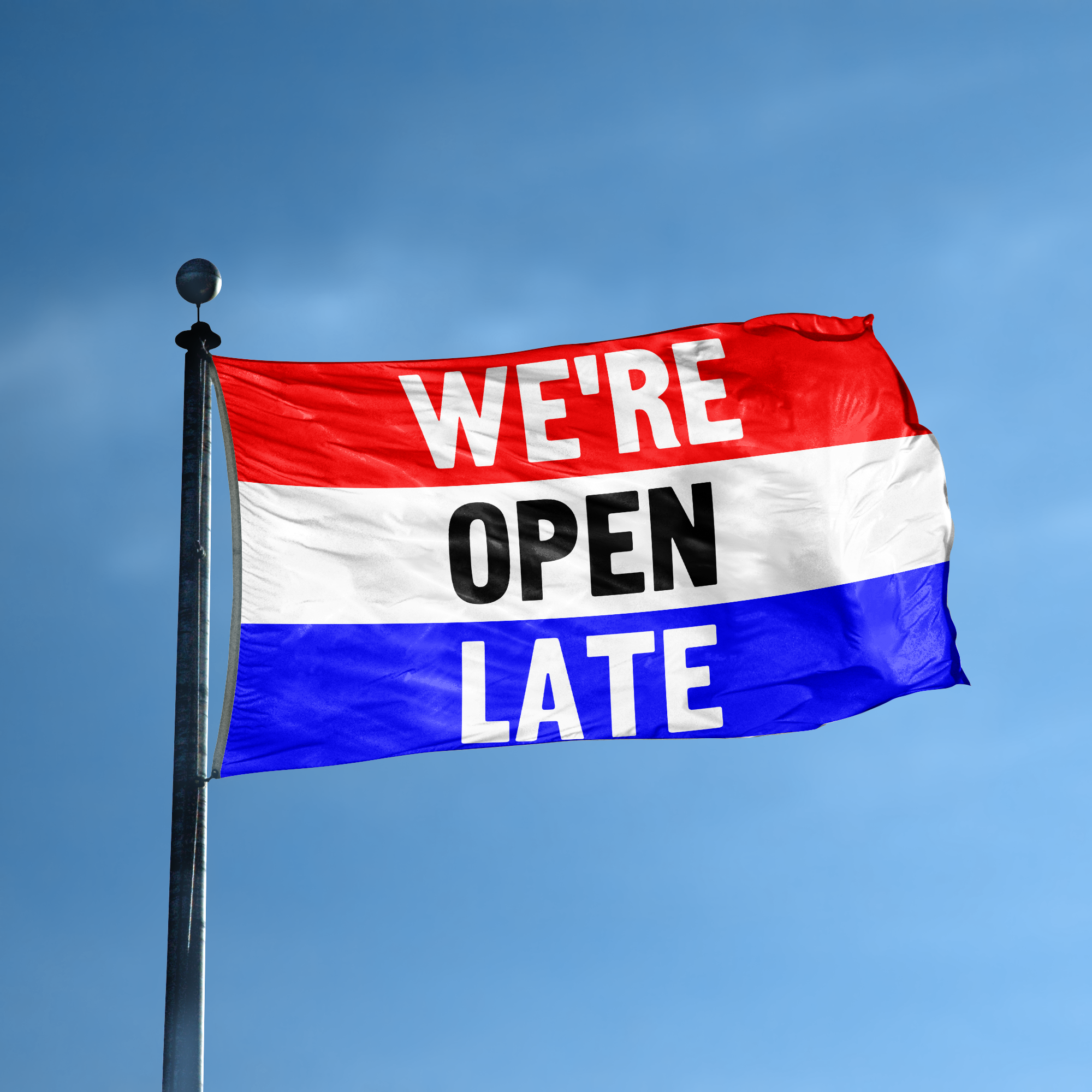 A business banner with the saying "We're Open Late" displayed on a high pole, with a red, white, and blue color scheme.