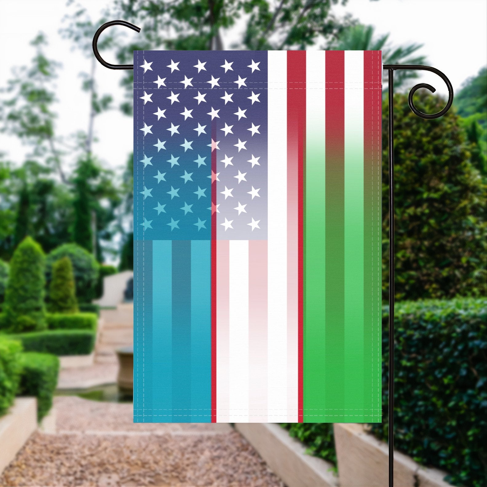 A garden flag with the Uzbek American flag design seamlessly blended with the American flag, displayed in a garden.