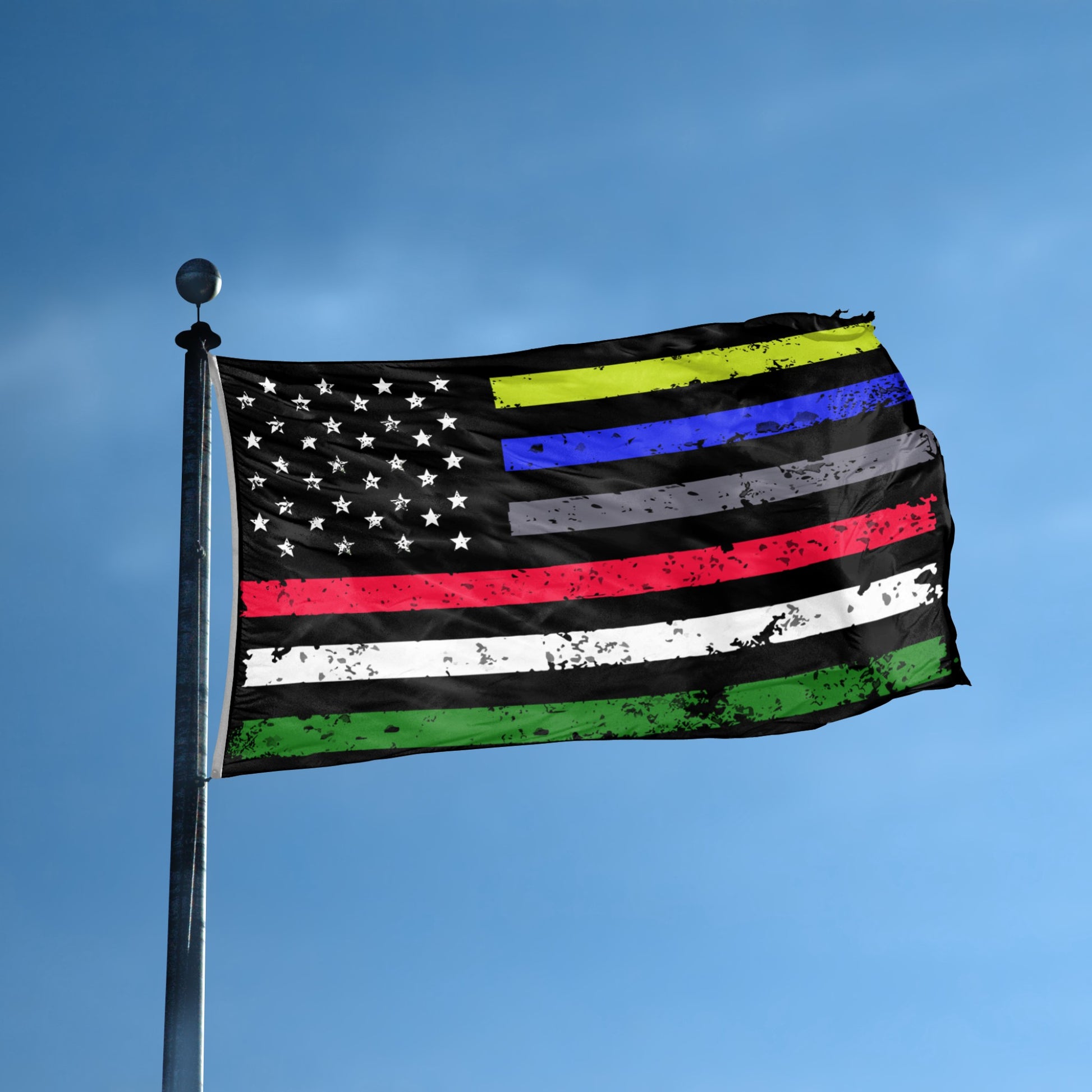 American flag with first responders horizontal stripes in black, green, blue, red, gray, yellow, and white against a clear blue sky.