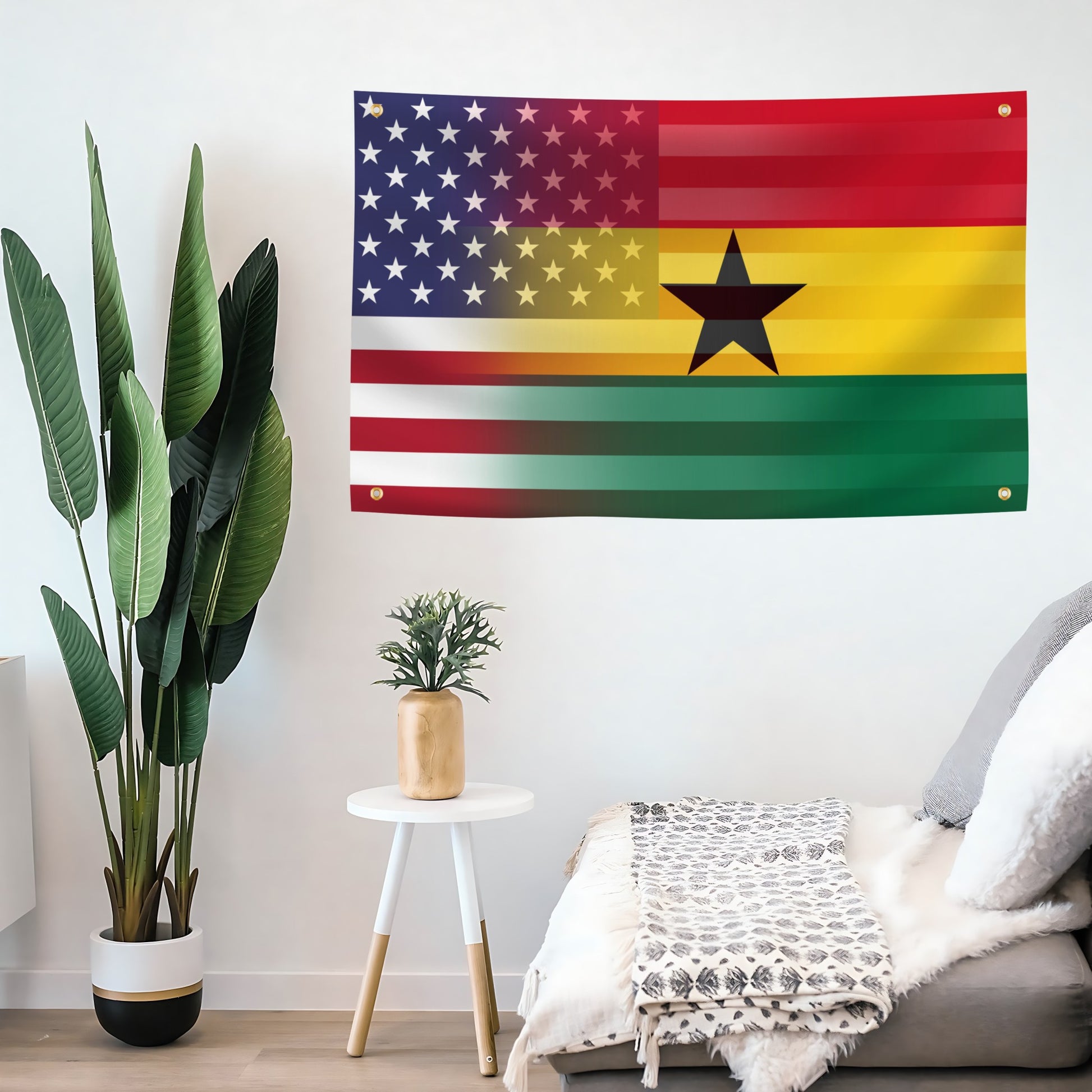 Living room with a Ghanaian flag blended with the American flag hanging on the wall. 