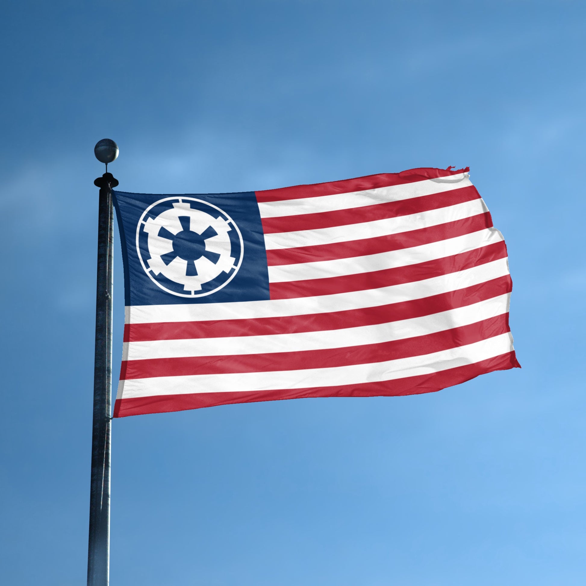 A flag with the theme "Star Wars Galactic Empire American" displayed on a tall flag pole and blue skies.