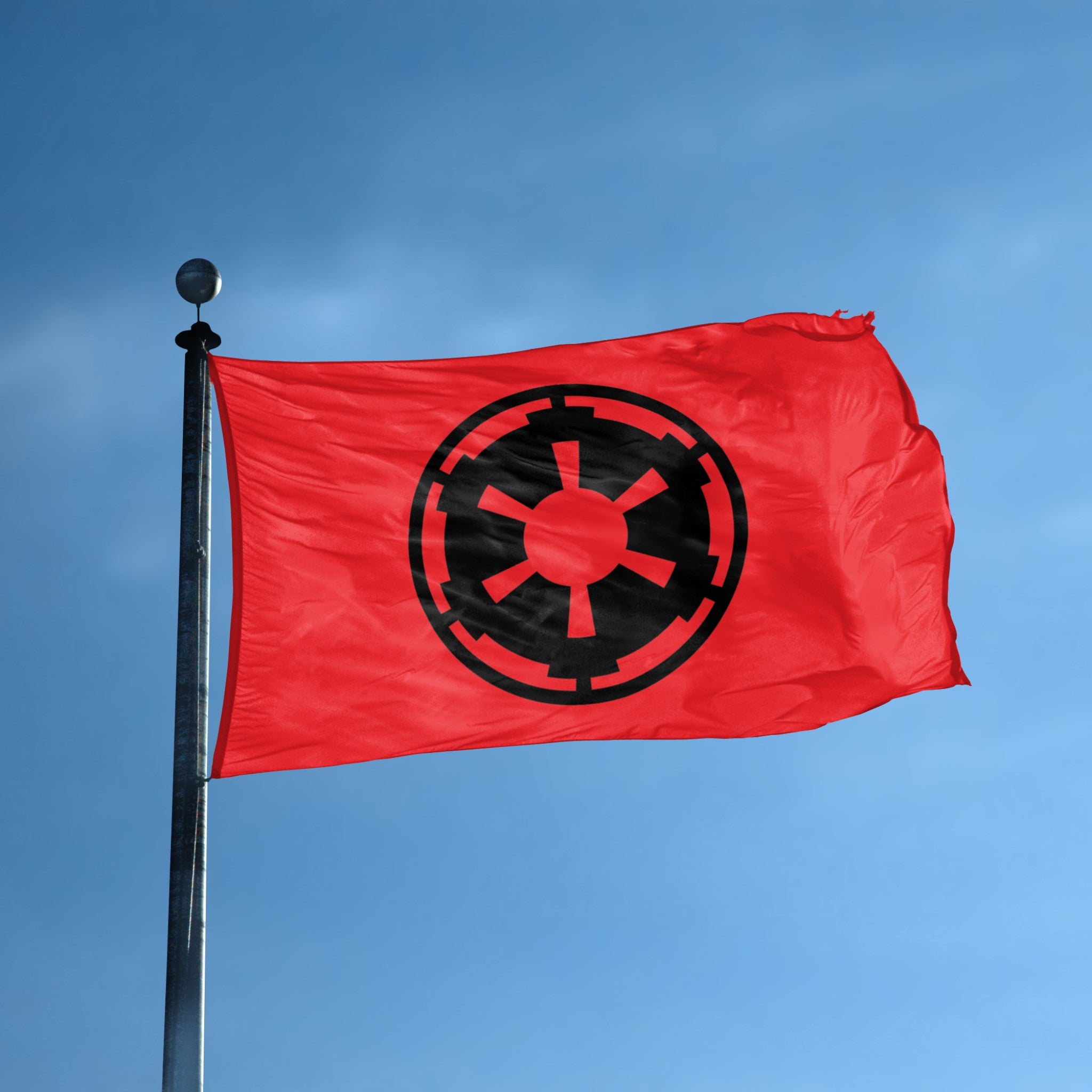 Star Wars Galactic Empire Flag (Red) on a flagpole against a blue sky.