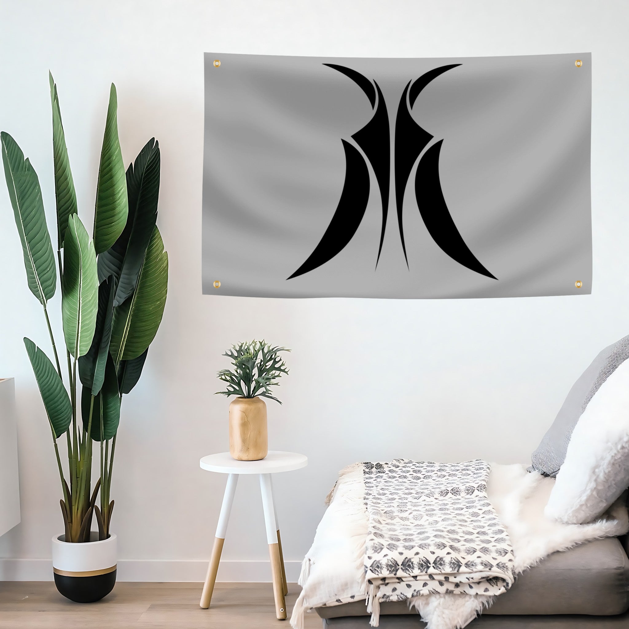 Silver flag banner with black Star Wars Grievous crest on a living room wall.