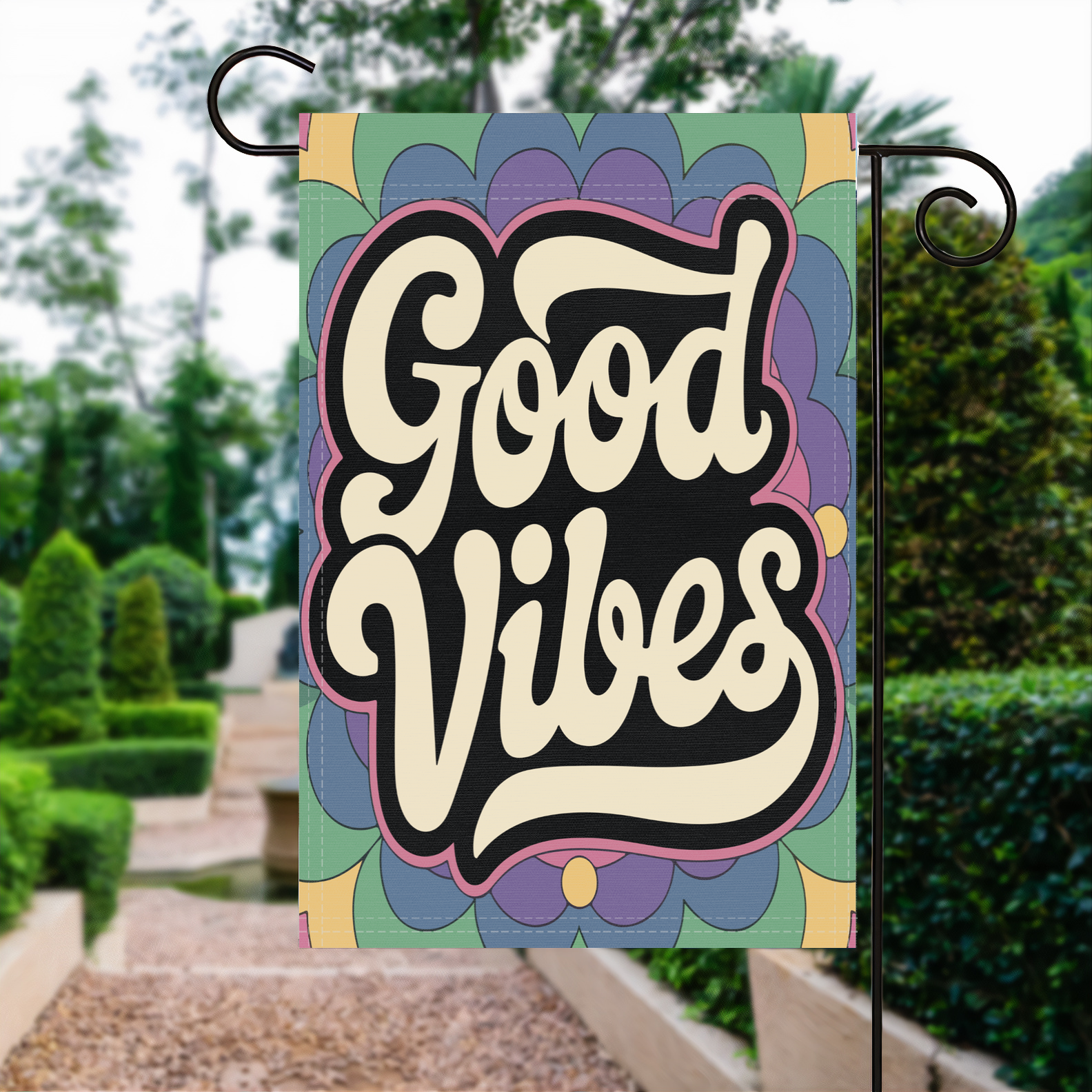 Groovy Good Vibes garden flag made of weatherproof polyester displayed in a garden | Bannerfi
