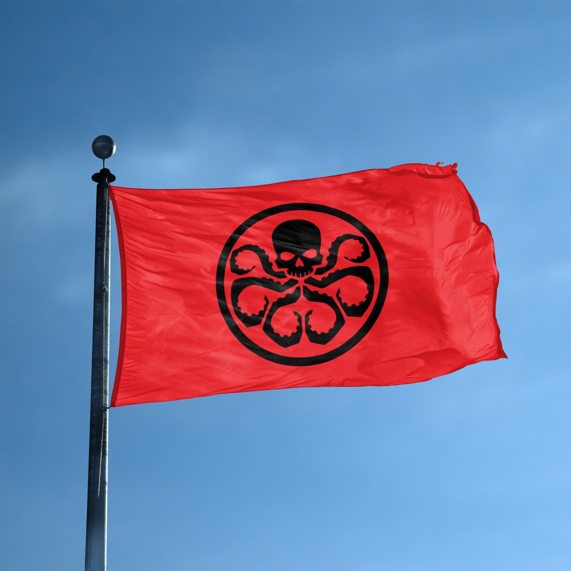 Red flag with a black Hail Hydra symbol on a flagpole against a blue sky.