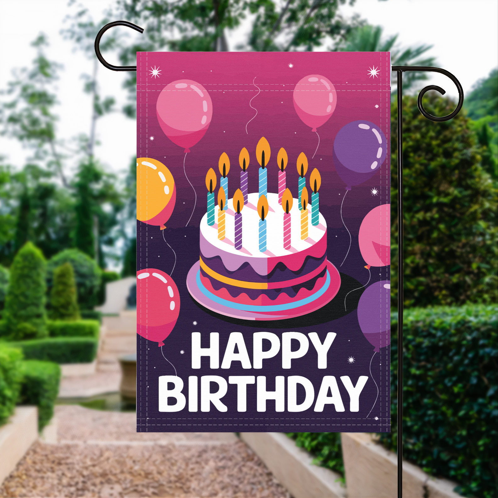 Happy Birthday garden flag made of weatherproof polyester displayed in a garden | Bannerfi