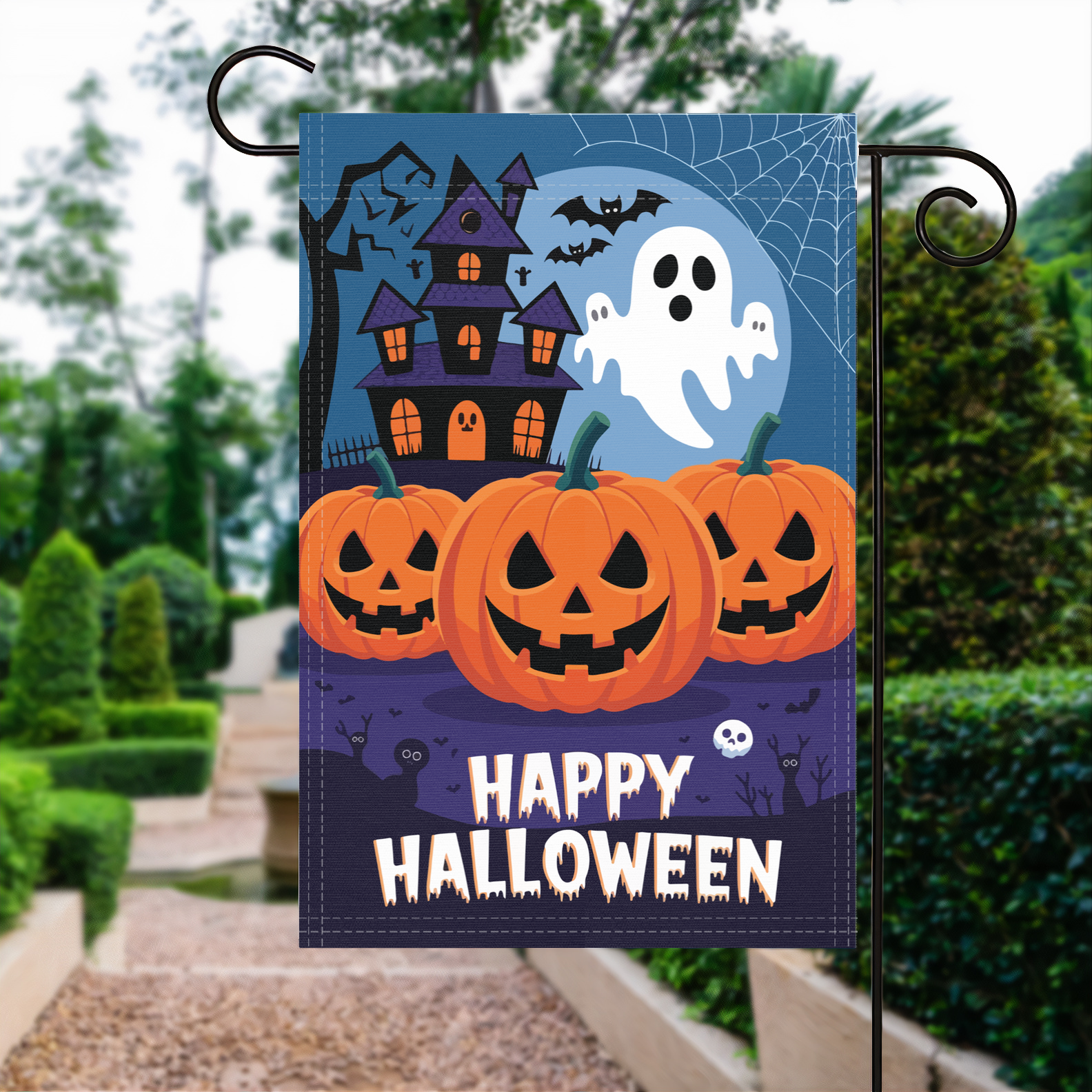 Happy Halloween garden flag made of weatherproof polyester displayed in a garden | Bannerfi