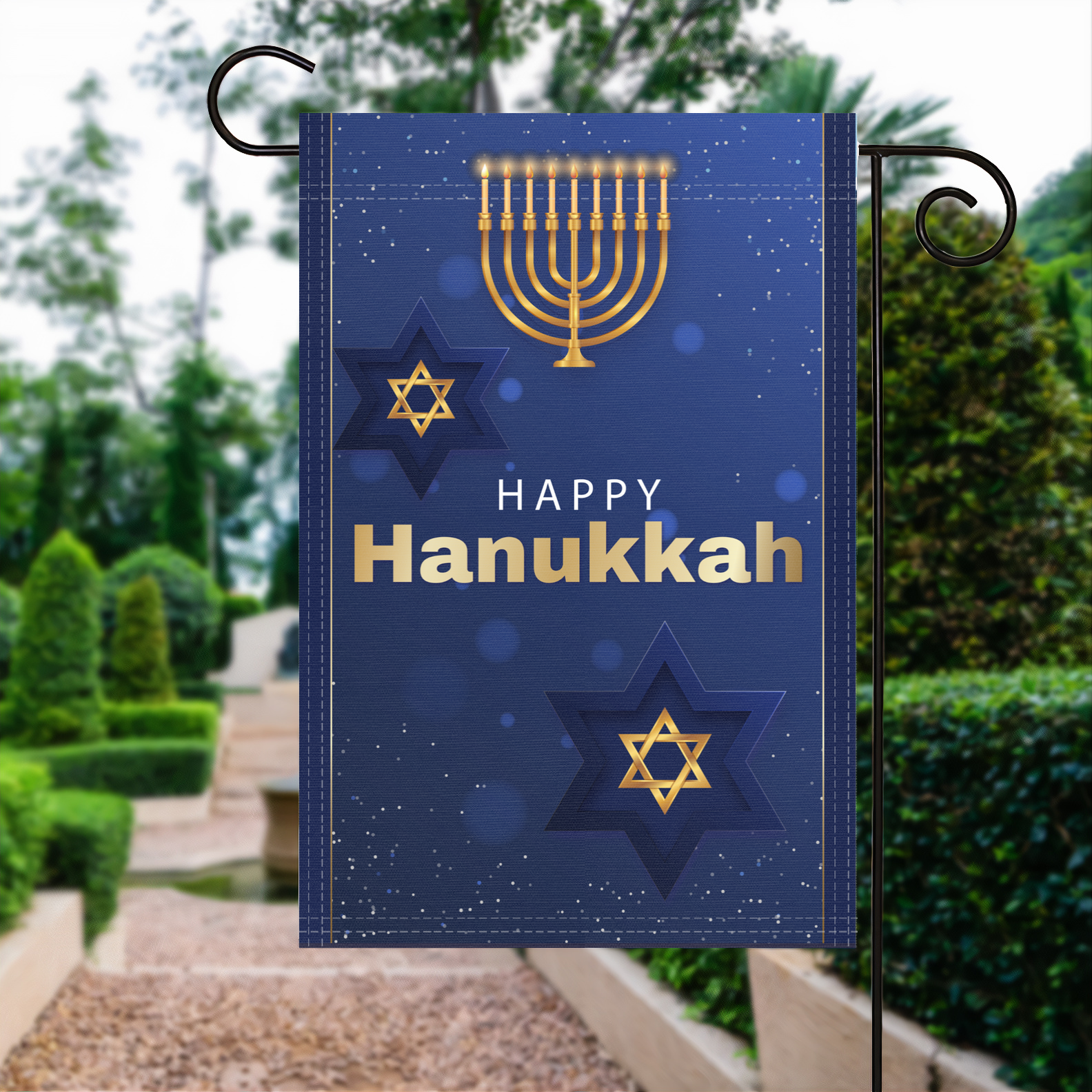 Happy Hanukkah garden flag made of weatherproof polyester displayed in a garden | Bannerfi